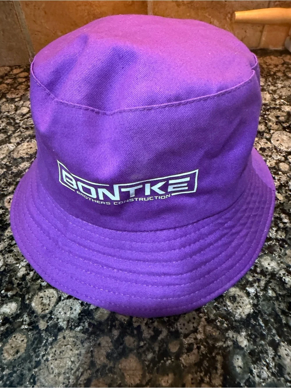 ACU reversible Purple Bucket Hat with Mascot Logo and patterned on other side